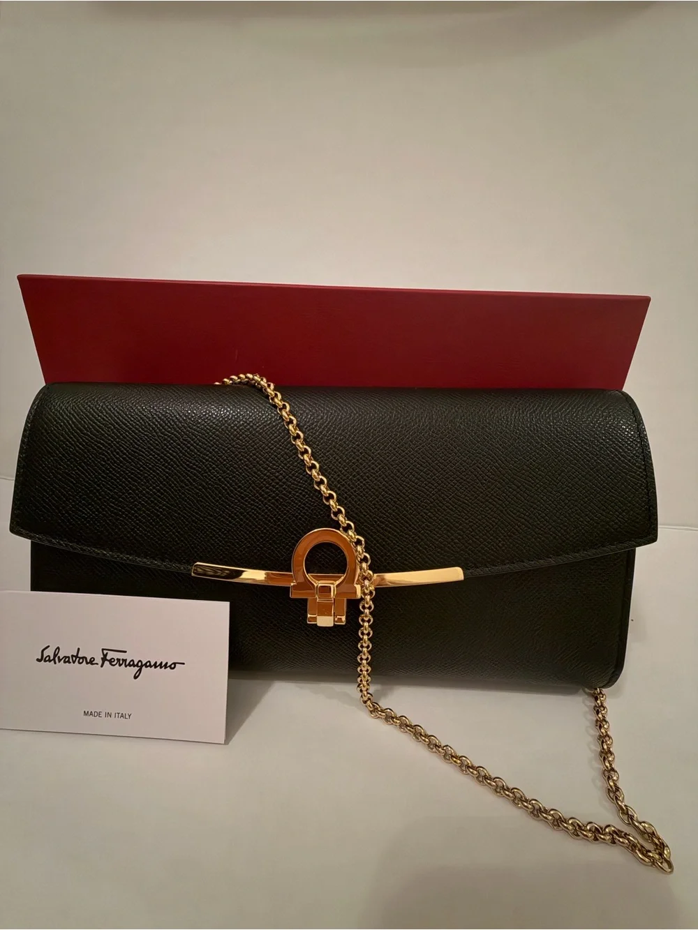 Salvatore Ferragamo Black Leather Clutch with Gold Gancini Bar